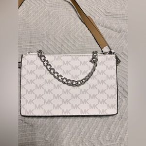 MK belt bag, perfect size for cell phone and wallet. Never worn